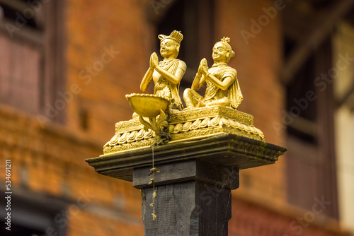 Bandipur, Nepal - Detail of a small statue in a temple of Bazaar Street  photo