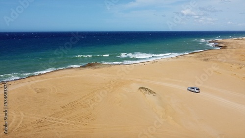 Colombia , Guajira , Cabo de la Vela , Punta Galinas is a remote desert village on Colombia’s northern when the sand of the desert and the dunes arrive in the ocean sea- drone aerial view