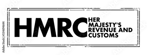 HMRC Her Majesty's Revenue and Customs - non-ministerial department of the UK Government responsible for the collection of taxes,  acronym text concept stamp photo