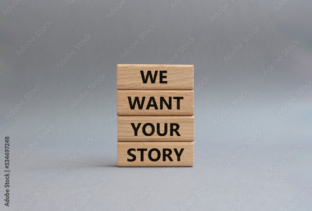 We want your story symbol. Concept words We want your story on wooden blocks. Beautiful grey background. Business and We want your story concept. Copy space. We want your story symbol. Concept words We want your story on wooden blocks. Beautiful grey background. Business and We want your story concept. Copy space.