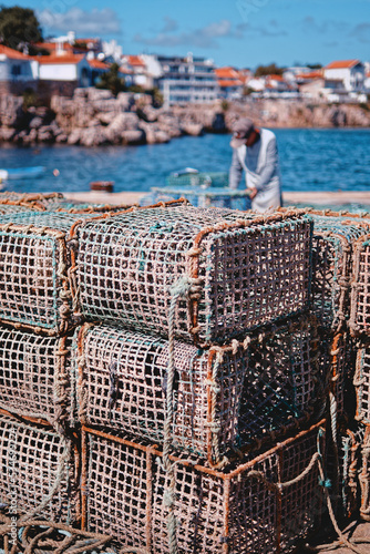 traditional lobster pots on the dock in Cascais Lisbon Portugal © Pedro