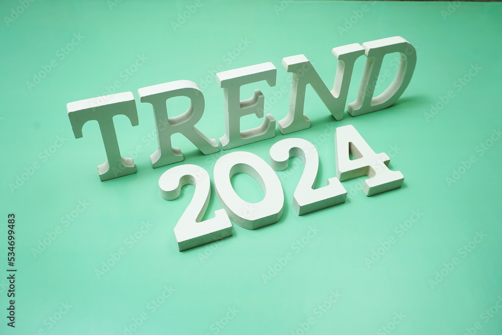 Trend 2024 alphabet letter on green background