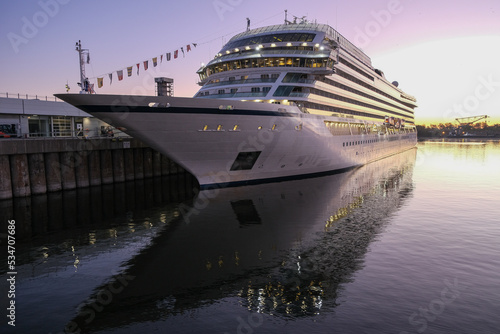 Viking cruiseship or cruise ship liner Star in port of Montreal, Canada during sunrise before cruise on St. Lawrence River for Indian summer East Coast cruising