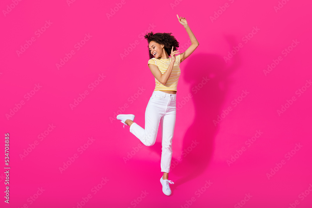 Ful size photo of lovely young lady dance bachelorette party dressed stylish yellow striped outfit isolated on bright pink color background Ful size photo of lovely young lady dance bachelorette party dressed stylish yellow striped outfit isolated on bright pink color background