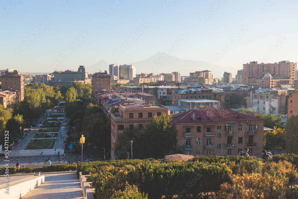 Yerevan, Armenia, beautiful super-wide angle panoramic view of Yerevan with Mount Ararat, cascade complex, mountains and scenery beyond the city, summer sunny day