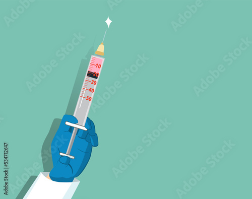 Blue gloved hand of doctor or nurse holding syringe with liquid vaccine before injecting on green background with right copy space