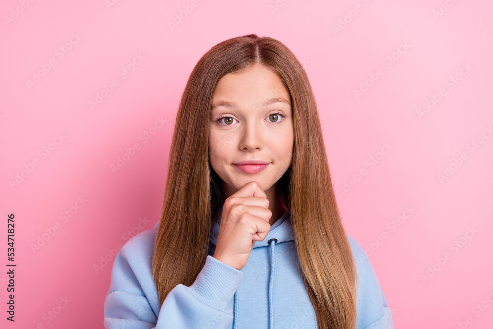 Closeup photo of young pretty nice positive smart lady schoolgirl wear blue hoodie touch chin minded focused look you isolated on bright pink color background Closeup photo of young pretty nice positive smart lady schoolgirl wear blue hoodie touch chin minded focused look you isolated on bright pink color background