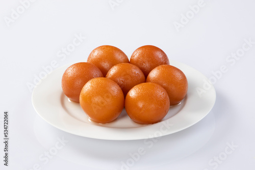 indian sweet gulab jamun closeup view.Sweet Gulab Jamun served in white ceramic bowl.