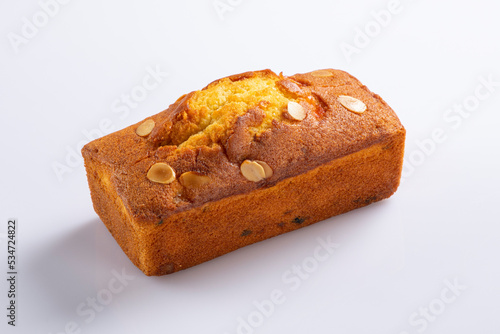 Sliced moist butter cake isolated over the white background. Pineapple sponge cake slices