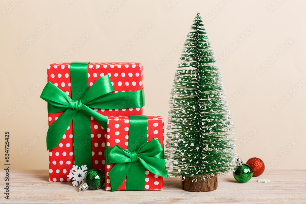 Christmas composition. craft Gift box, small tree, branches and craft DIY decorations on white background. New year concept. Christmas home decoration Flat lay, top view, copy space Christmas composition. craft Gift box, small tree, branches and craft DIY decorations on white background. New year concept. Christmas home decoration Flat lay, top view, copy space