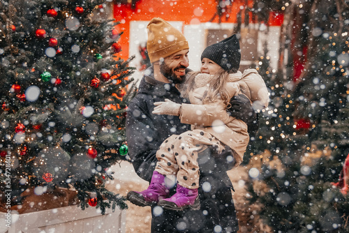 Εκτύπωση καμβά Photo of stylish family daddy daughter piggyback happy positive smile look each