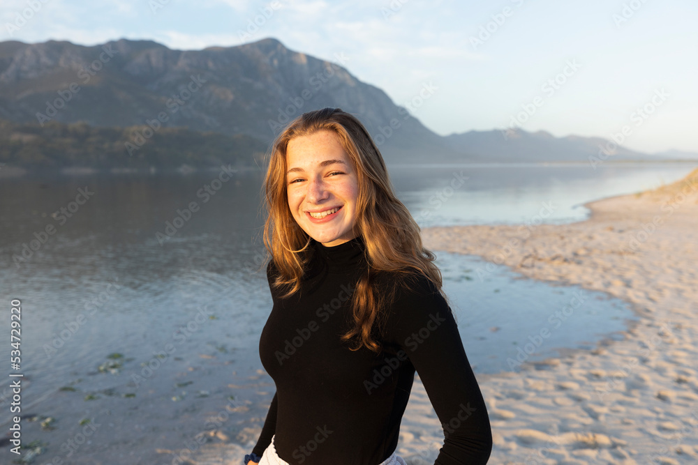 South Africa, Hermanus, Portrait of teenage girl (16-17) on Grotto Beach South Africa, Hermanus, Portrait of teenage girl (16-17) on Grotto Beach