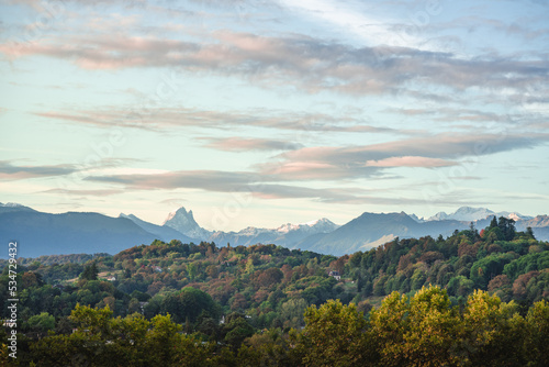 Pic du Midi d'Ossau from the Boulevard des Pyrénées in Pau, with first snow and fall's colors of October photo