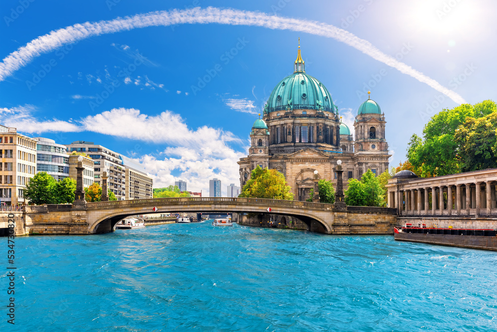 View of the bridges on the Spree and Attractive cathedral or Berliner Dom on Museum Island, Germany