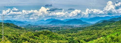 Luang Prabang, amazing view from mountain top to the city of Luang Prabang seated between mountain and mekong river. High quality photo © SimonMichael