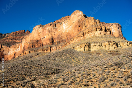 Looking up at Grand Canyon Wall and Blue Sky