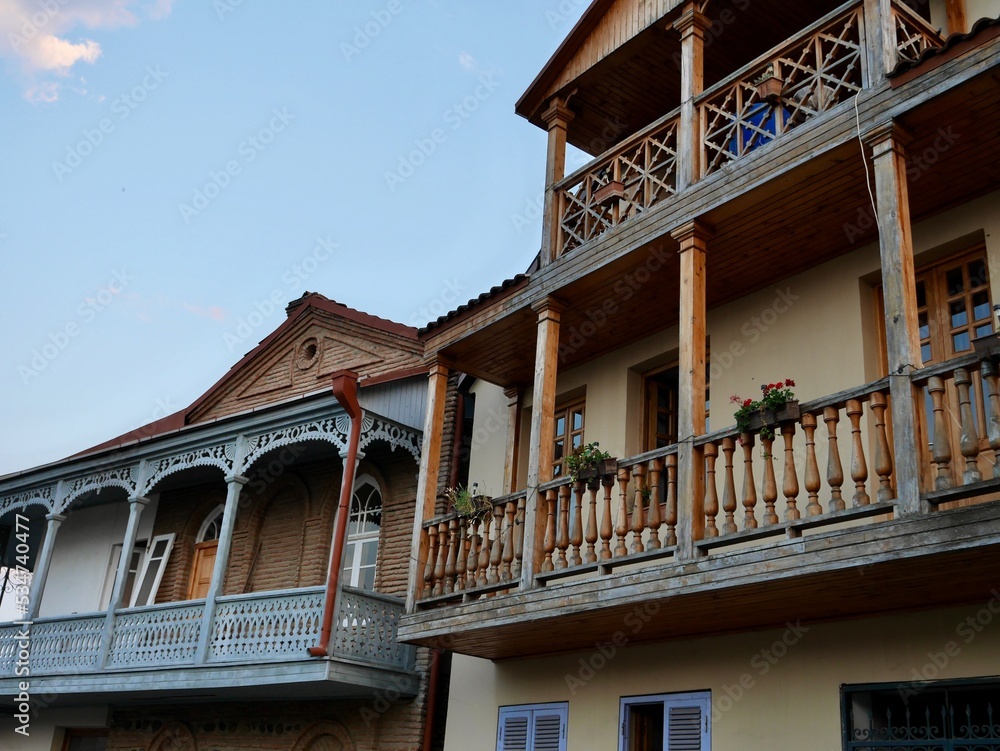 Traditional house with wooden balcony in old historical part of Telavi town, capital city of Kakheti region, Georgia.