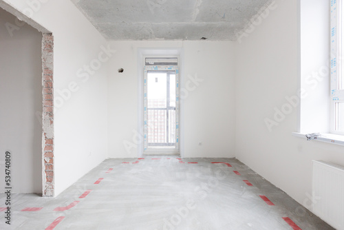 interior of the apartment without decoration in gray colors