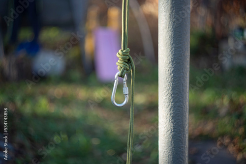 Carabiner hanging on a rope