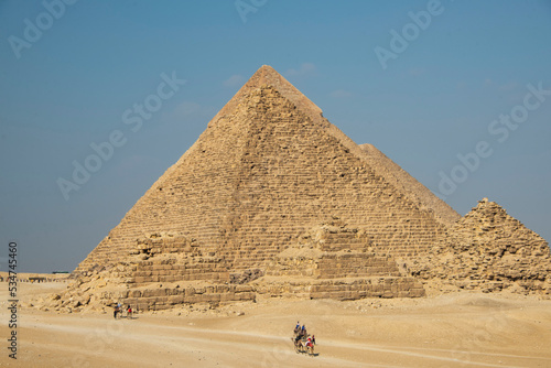three egyptian pyramids in the desert