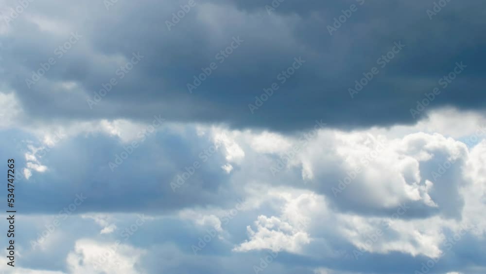 White clouds in the sky. Air plane window view time lapse clouds and blue sunny sky. Loop of white clouds over blue sky with sun Rays. Aerial view. Drone shooting clouds motion time. 4K. Timelapse White clouds in the sky. Air plane window view time lapse clouds and blue sunny sky. Loop of white clouds over blue sky with sun Rays. Aerial view. Drone shooting clouds motion time. 4K. Timelapse
