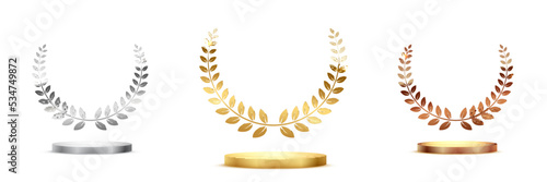 Golden, silver and bronze award signs with laurel wreath isolated on white background. Vector award design templates