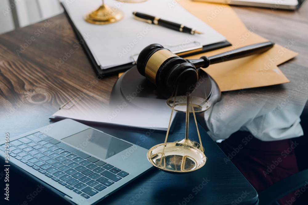 justice and law concept.Male judge in a courtroom on wooden table and Counselor or Male lawyer working in office. Legal law, advice and justice concept. justice and law concept.Male judge in a courtroom on wooden table and Counselor or Male lawyer working in office. Legal law, advice and justice concept.