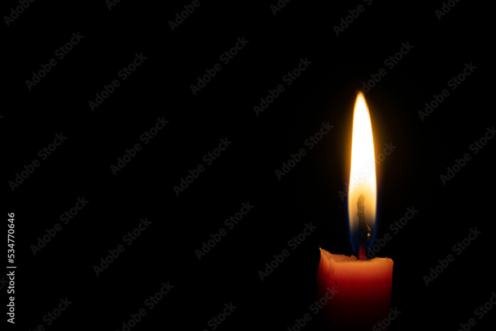 The candle is burning. Can be used as an advanced background.