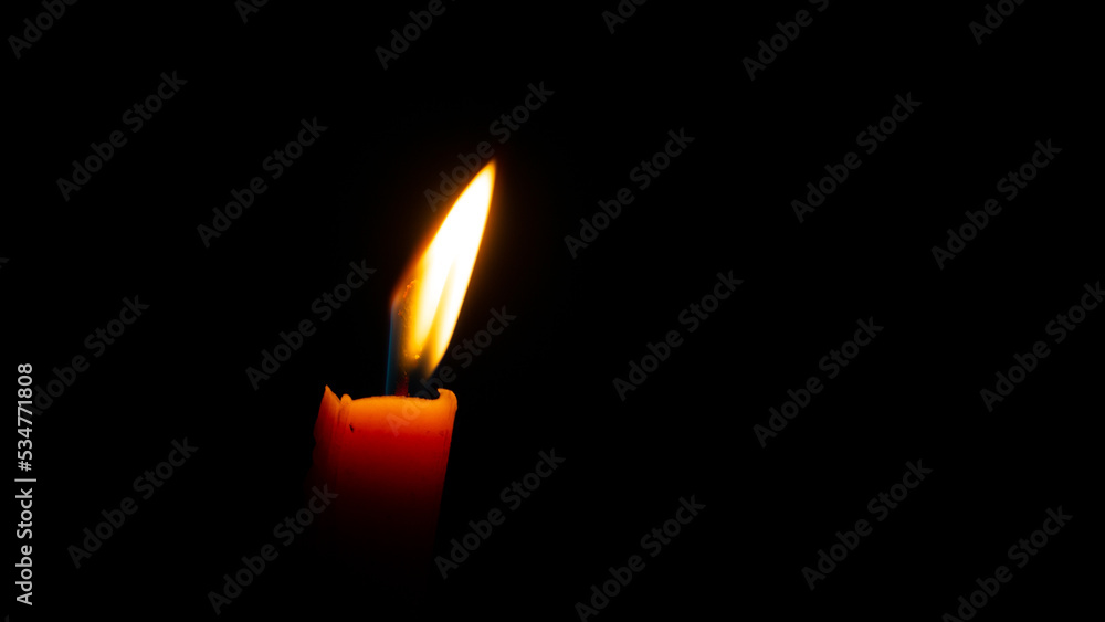 The candle is burning. Can be used as an advanced background. The candle is burning. Can be used as an advanced background.