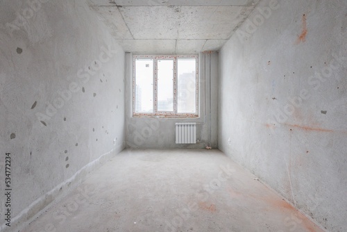 interior of the apartment without decoration in gray colors