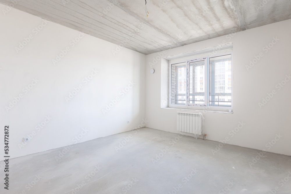 interior of the apartment without decoration in gray colors interior of the apartment without decoration in gray colors