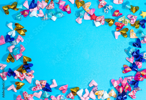 paper hearts isolated on blue background