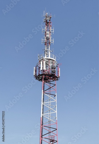 Technology on the top of the telecommunication GSM (5G,4G) tower with copy space.Cellular phone antennas on a building roof.Telecommunication mast television antennas.Development communication system