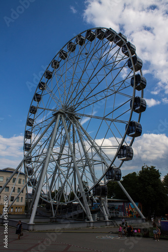 VLADIMIR, Russia - AUGUST, 18, 2022: Ferris wheel attraction in the park of the 850th anniversary of the city on a summer day