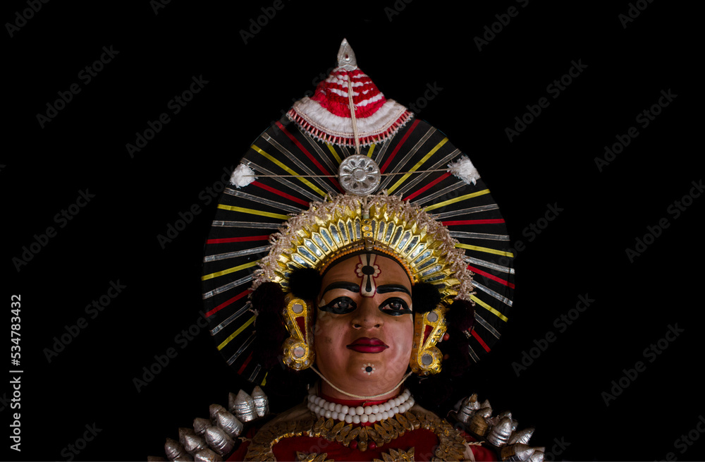 Statue of Yakshagana dace artist isolated on black background. Yakshagana is a traditional folk dance of India.