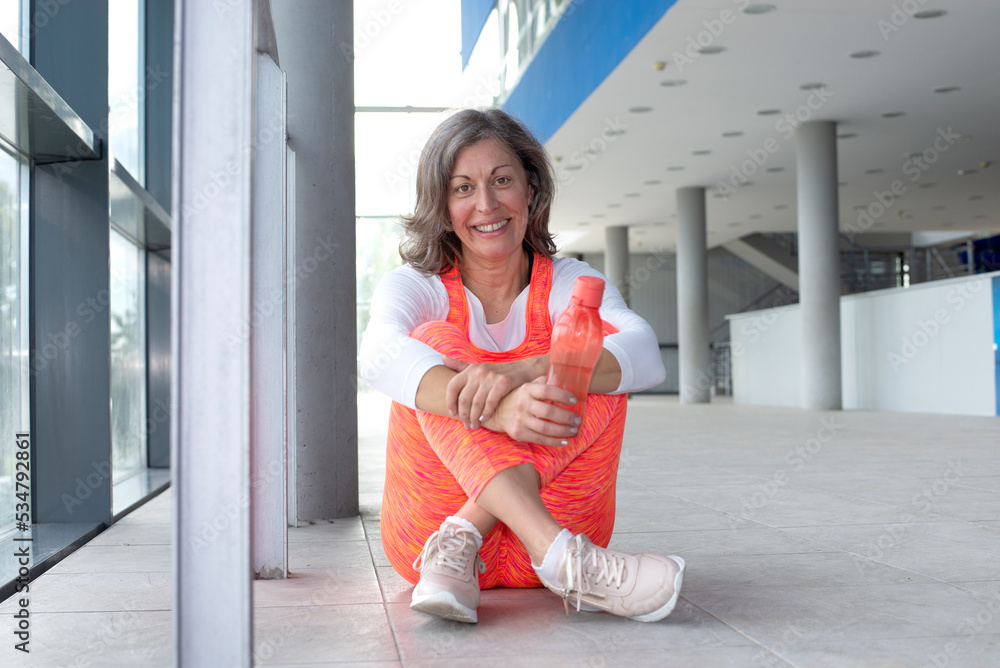 Portrait of cheerful senior woman in sportwear Portrait of cheerful senior woman in sportwear
