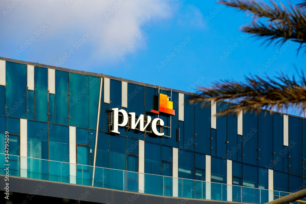 Haifa, Israel July 22, 2022 PWC logo on facade of office building on