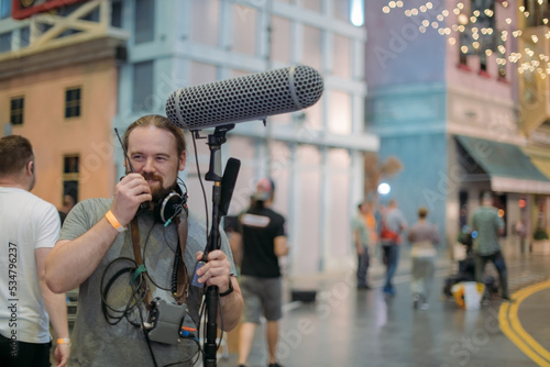 фотографія Sound engineer with a microphone on the set