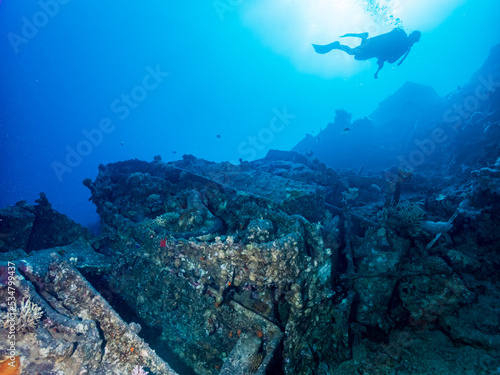 Submerged military tracked vehicles and support vehicles at Ras Peter or Tank Reef dive site in the Red Sea, Egypt. Underwater photography and travel.