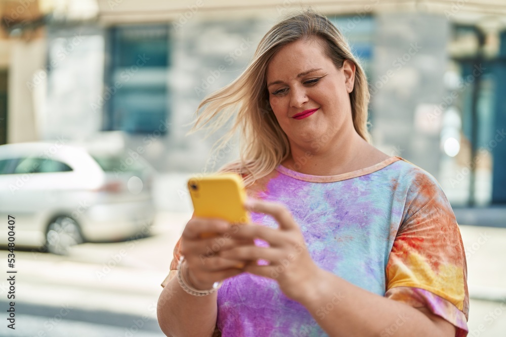 Young woman smiling confident using smartphone at street Young woman smiling confident using smartphone at street
