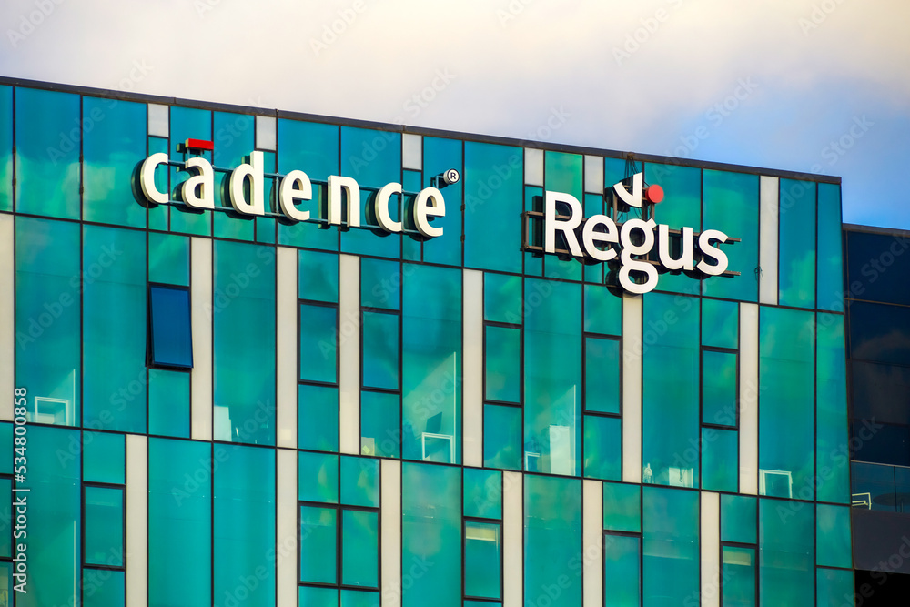 Haifa, Israel. logos Regus and Cadence on facade of office building on