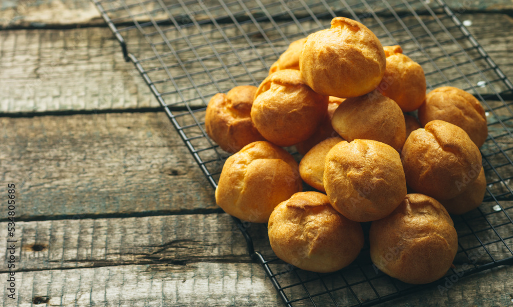 Hot buns on a wooden table. Custard buns