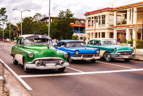 Photography colorful classic cars in the street of havana cuba
