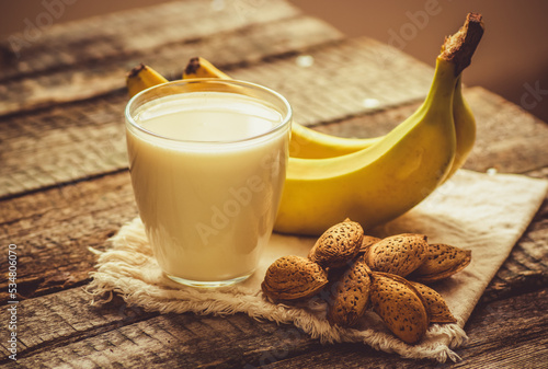 Almond milk with banana. Plant based alternative vegan milk