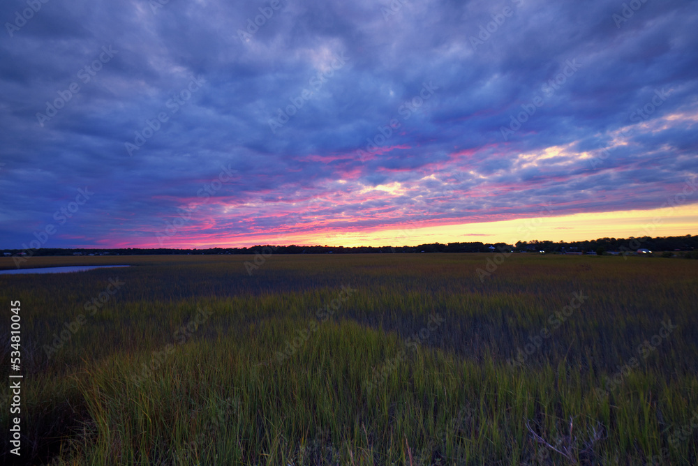A beautiful sunset over the marsh behind Pawleys Island, South Carolina, USA.