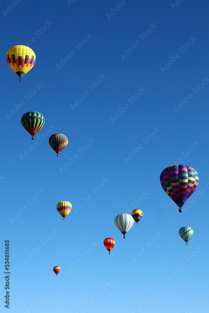Hot air balloons ascending into the sky. Hot air balloons ascending into the sky.
