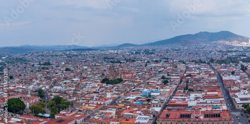 Aerial: scenic view of the landscape and cityscape in Morelia, Michoacan, Mexico. Drone view 