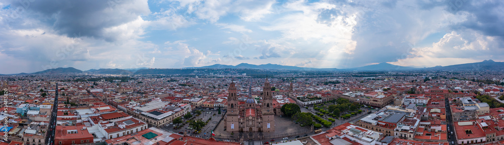 Aerial: scenic view of the landscape and cityscape in Morelia. Drone view
