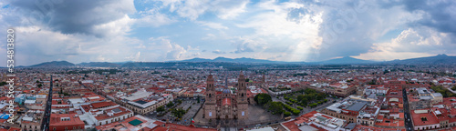 Aerial: scenic view of the landscape and cityscape in Morelia. Drone view 