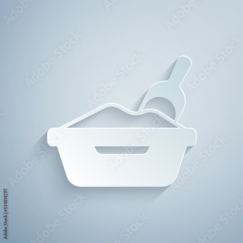 Paper cut Cat litter tray with shovel icon isolated on grey background. Sandbox cat with shovel. Paper art style. Vector